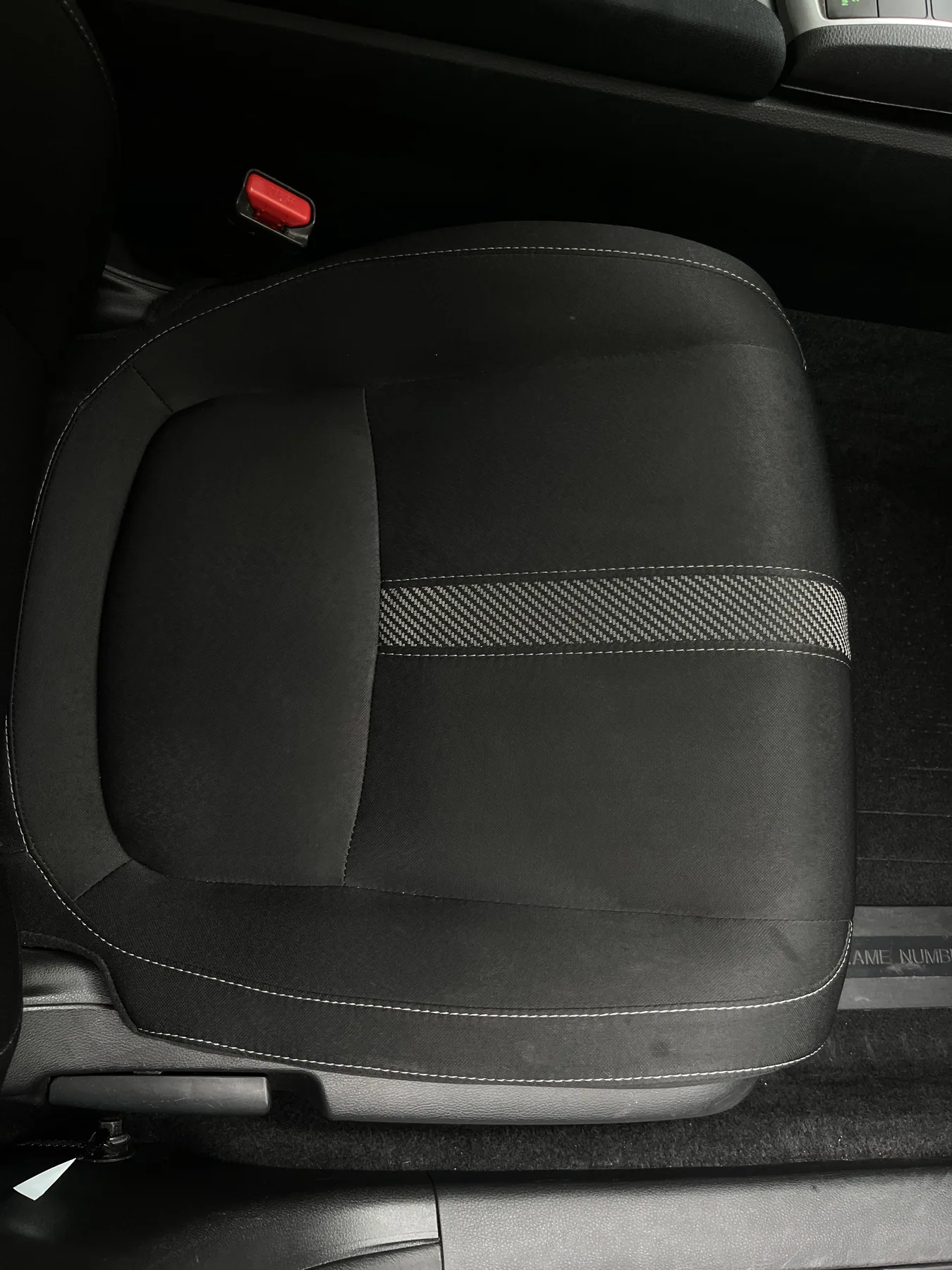 Freshly cleaned black cloth car seats