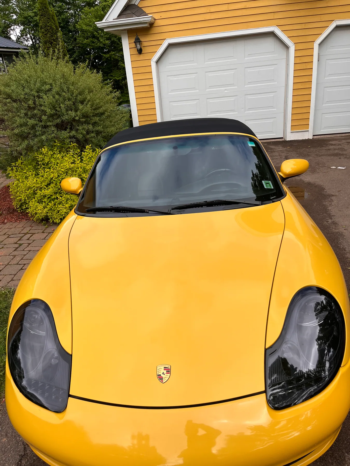 Yellow Porsche Boxster after an exterior detail